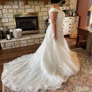 Never worn never altered wedding dress